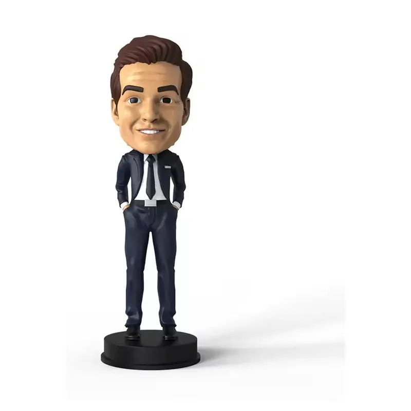 Smiling businessman bobblehead in a dark suit on a black base