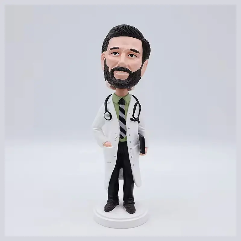 A bearded medical character bobblehead in a white coat