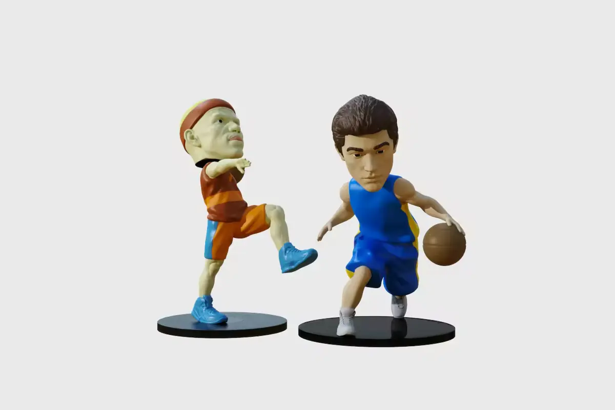 Two basketball character bobbleheads with oversized heads on display bases