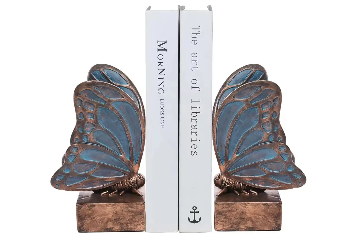 Blue butterfly-wing bookends with raised bronze-colored veins