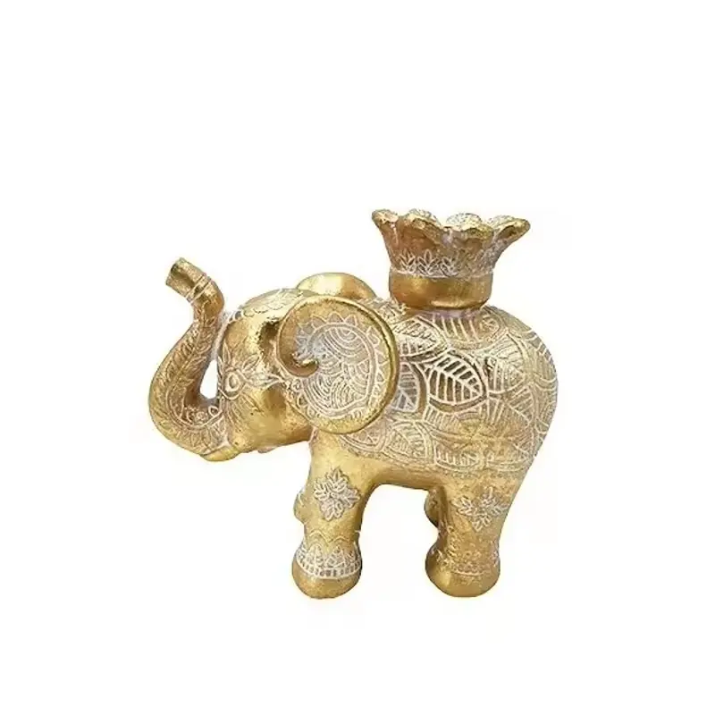 A gold-colored elephant holder with an empty upper cup