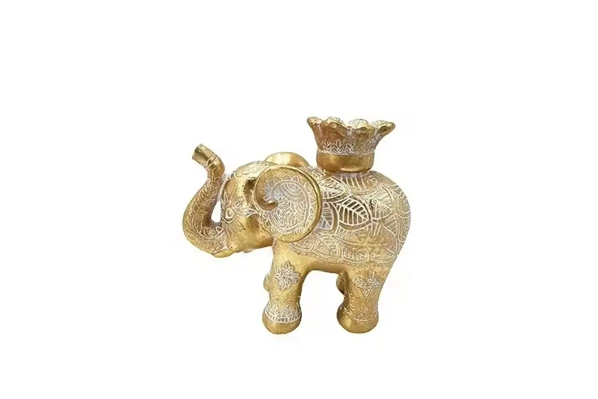 A gold-colored elephant candle holder with a raised upper cup