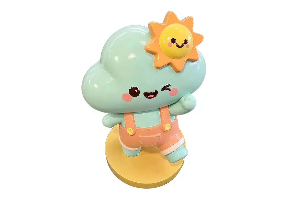 A pastel cloud and sun character figurine on a yellow base