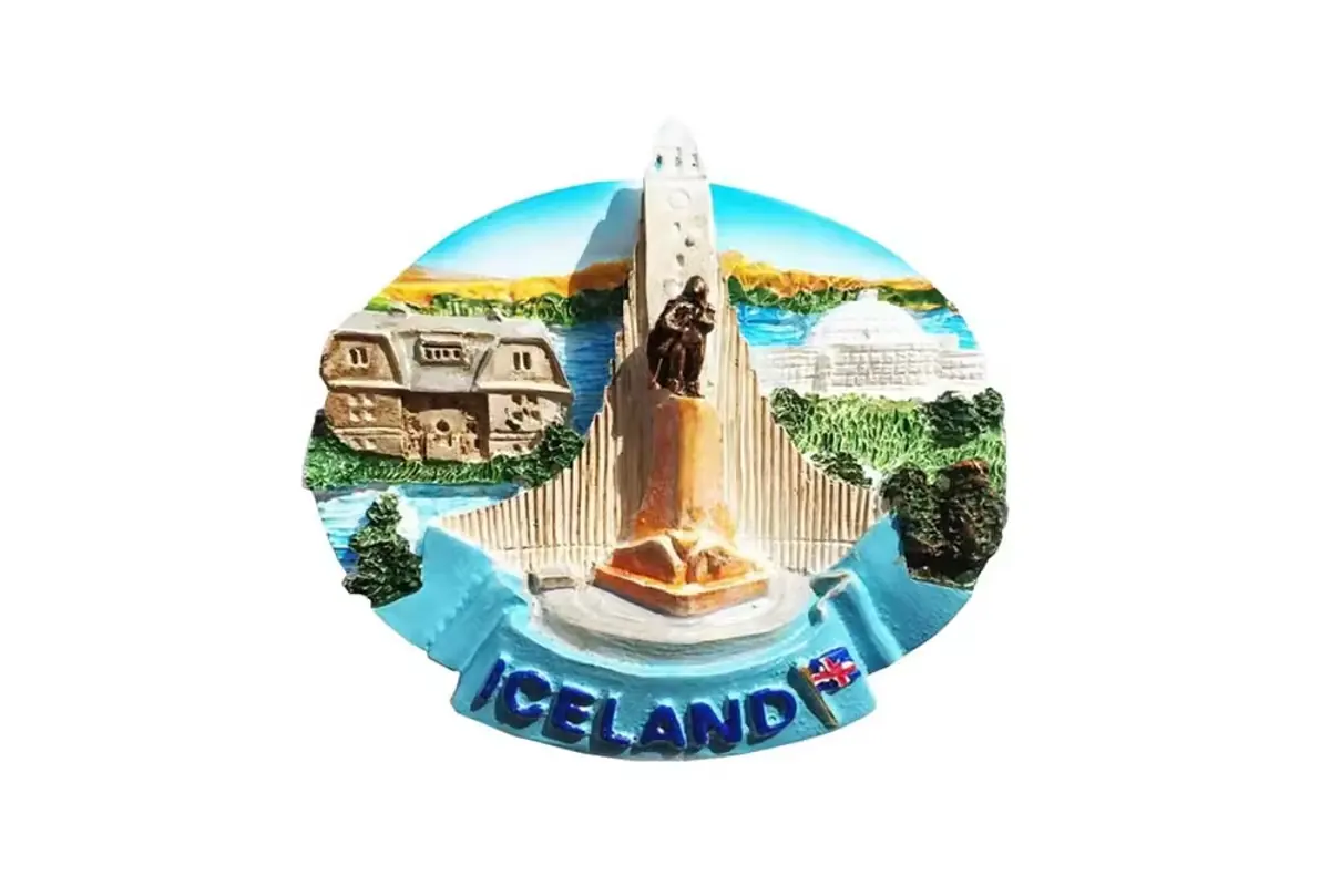 An Iceland souvenir refrigerator magnet with a raised landmark and name band
