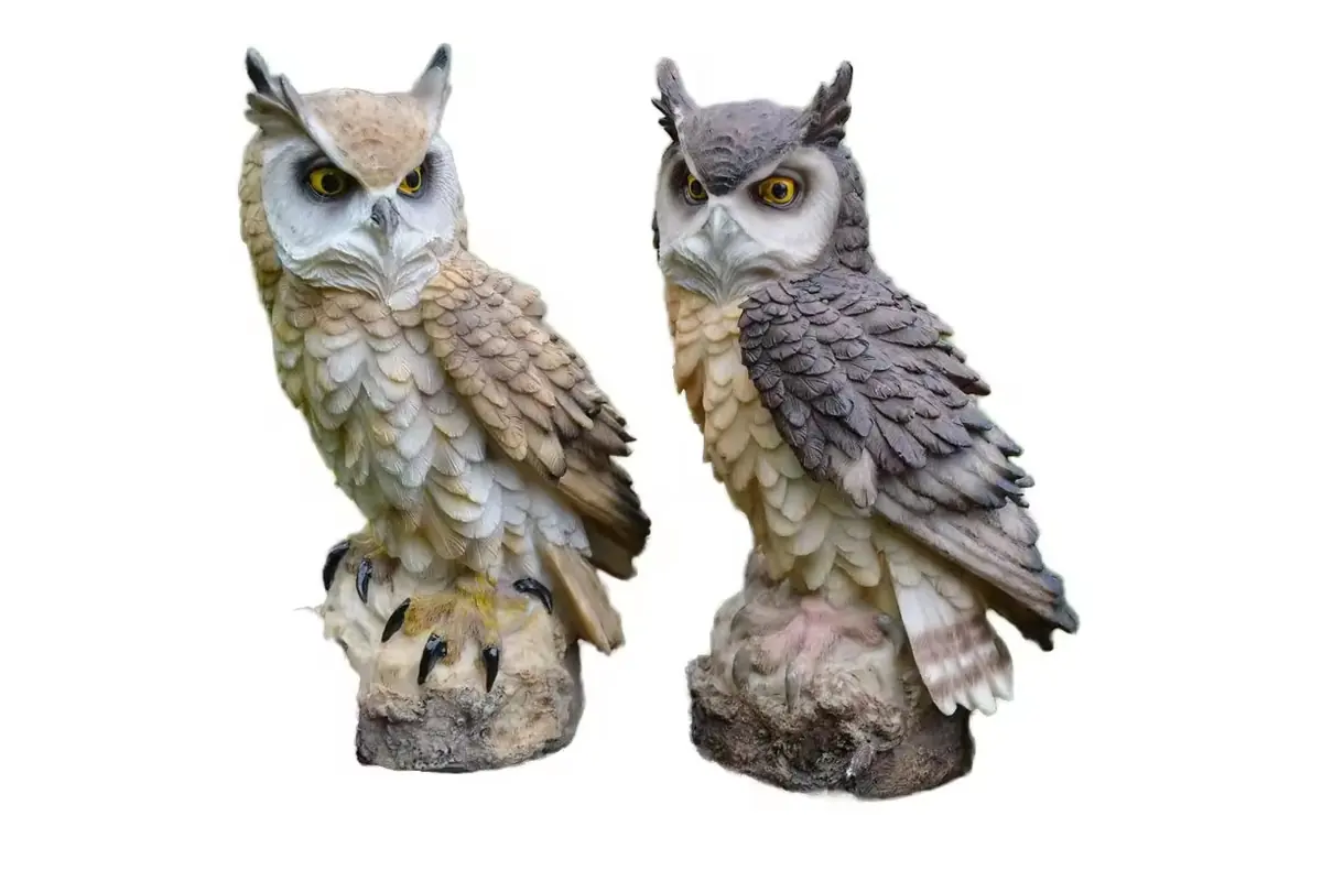 Two owl garden statues with raised feather texture and naturalistic colors