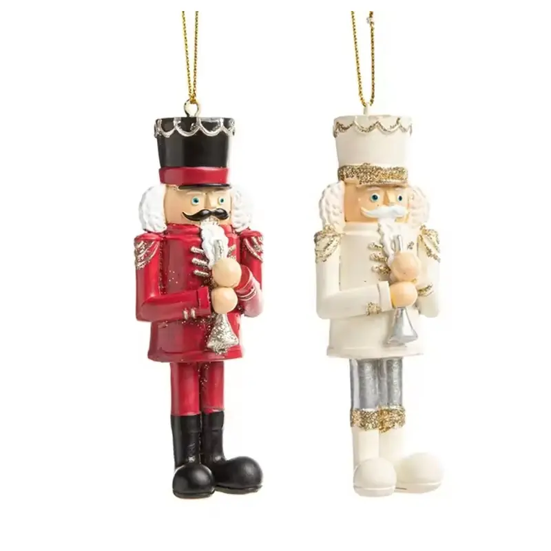 Red and ivory nutcracker hanging ornaments with gold cords