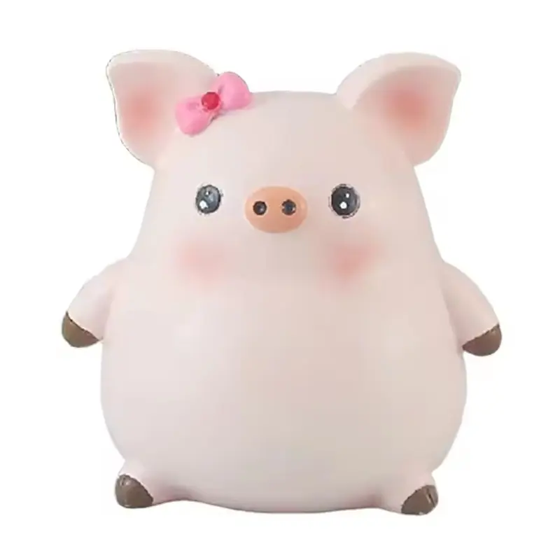 A pale pink pig-shaped coin bank with a pink bow