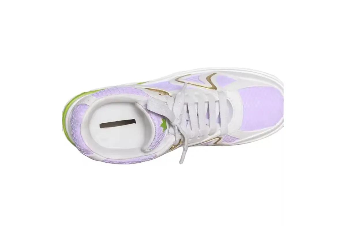 A sneaker-shaped coin bank viewed from above with its entry slot visible