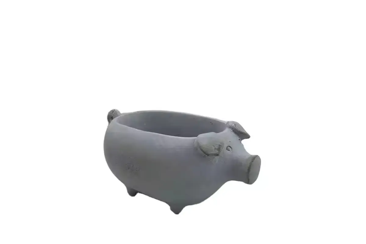 A gray pig-shaped planter with a broad open planting cavity