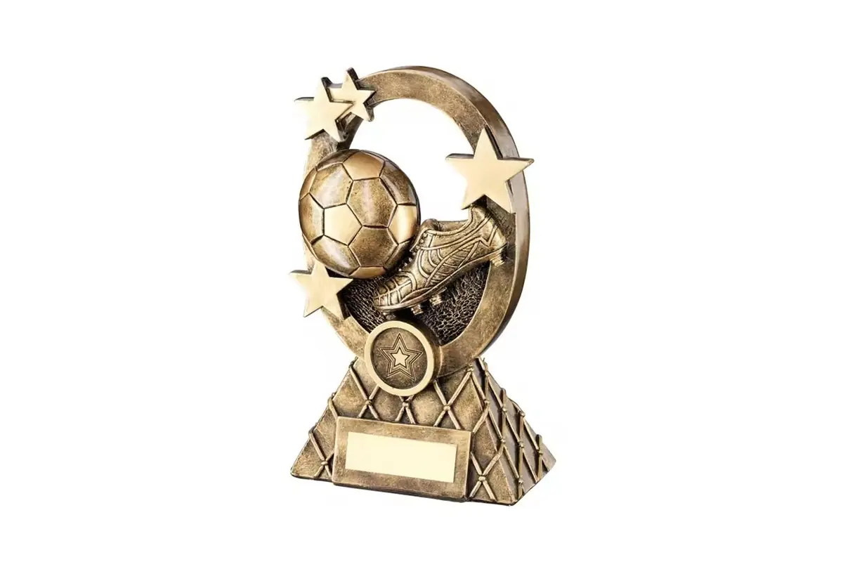 An antique-gold-colored football award with stars and a blank plaque